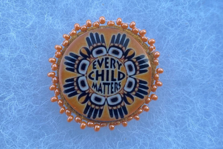 Every Child Matters beaded pin